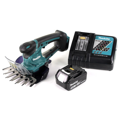 Makita DUM 604 18V Li-ion Akku Grasschere + 1 x BL1850 5,0 Ah Akku + 1 x DC 18 RC Ladegerät - Toolbrothers