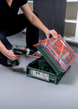 Metabo SB 18 L set taladro percutor inalámbrico 18 V 50 Nm (602317710) + 2x baterías 2,0 Ah + cargador + taller móvil 78 piezas + maletín