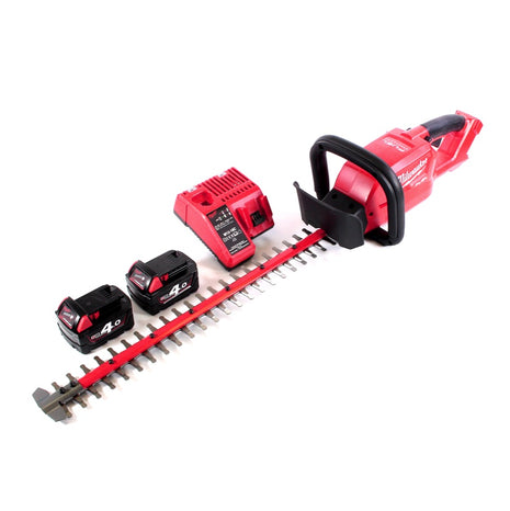 Taille-haie à batterie Milwaukee M18 CHT-402C 18 V 610 mm sans balai + 2x batteries 4,0 Ah + chargeur