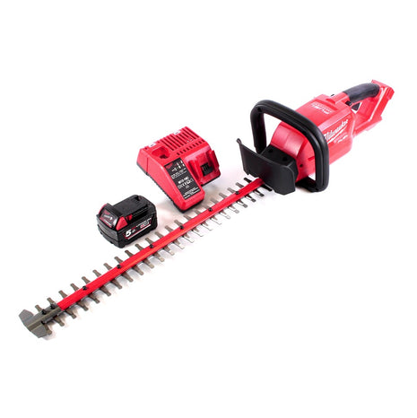 Taille-haie à batterie Milwaukee M18 CHT-501C 18 V 610 mm sans balai + 1x batterie 5,0 Ah + chargeur