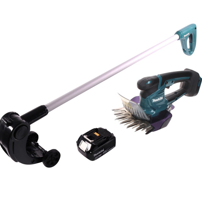 Tijeras para césped a batería Makita DUM 604 G1 18 V + mango alargador con rodillo + 1x batería 6,0 Ah - sin cargador