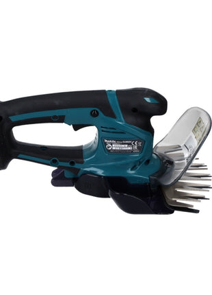 Tijeras para césped a batería Makita DUM 604 Z 18 V + mango alargador con rodillo - sin batería, sin cargador