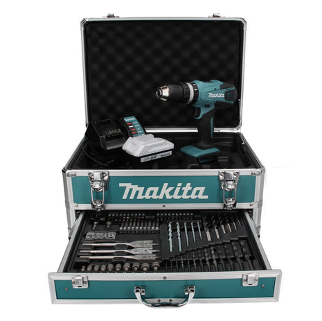 Taladro percutor inalámbrico Makita HP 457 DWX4 18 V 42 Nm Serie G + 1x batería 1,5 Ah + cargador + juego de brocas de 70 piezas + estuche